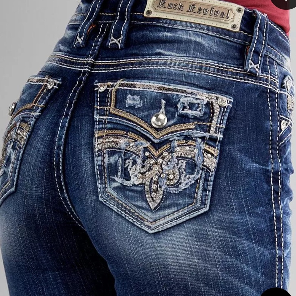 Rock Revival Blue Jeans with Decorative Stitching and Rhinestone Embellishments